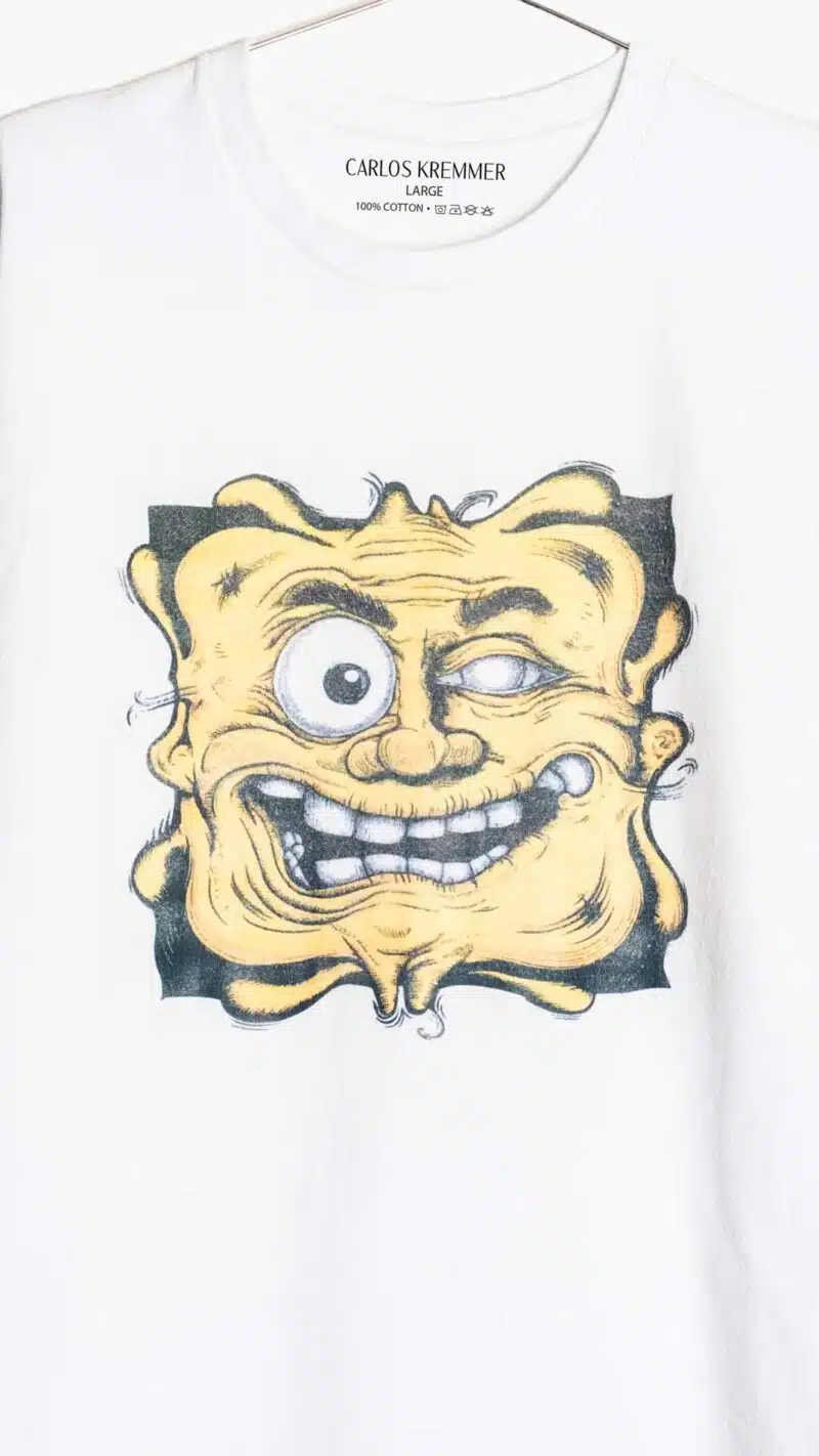 Hilarious Yellow Face Graphic Tee by Carlos Kremmer